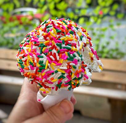 ice cream cone with rainbow sprinkles