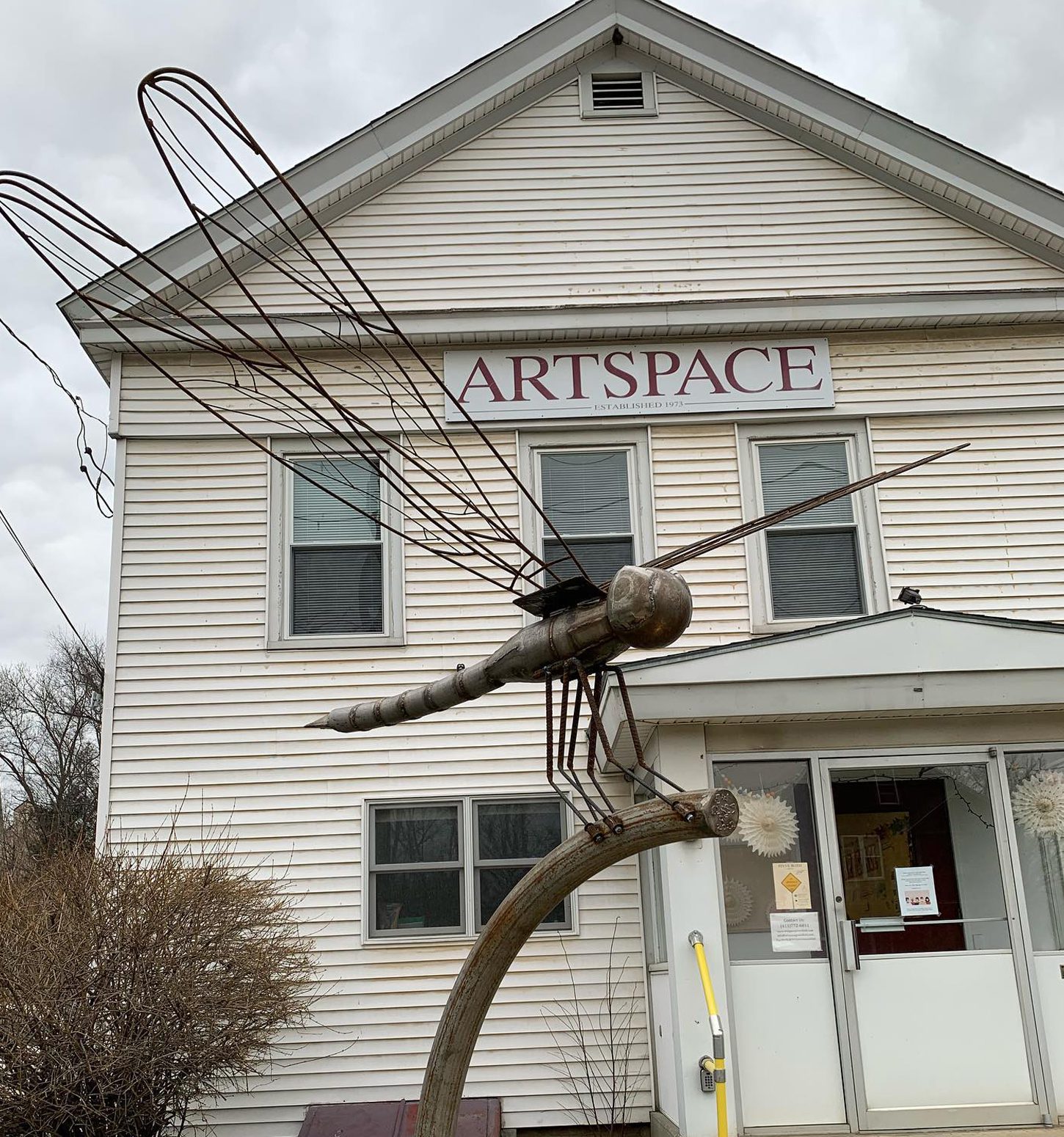 photo of artspace exterior with dragonfly art