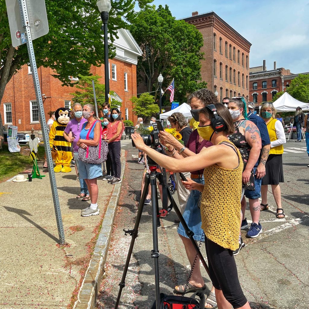 Told Video filming BeeFest downtown Greenfield